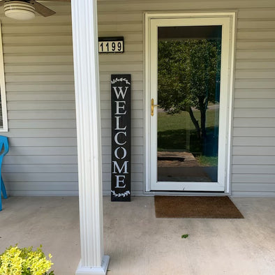Styling Your Porch with a Black Vertical Welcome Sign and Wreath Accents
